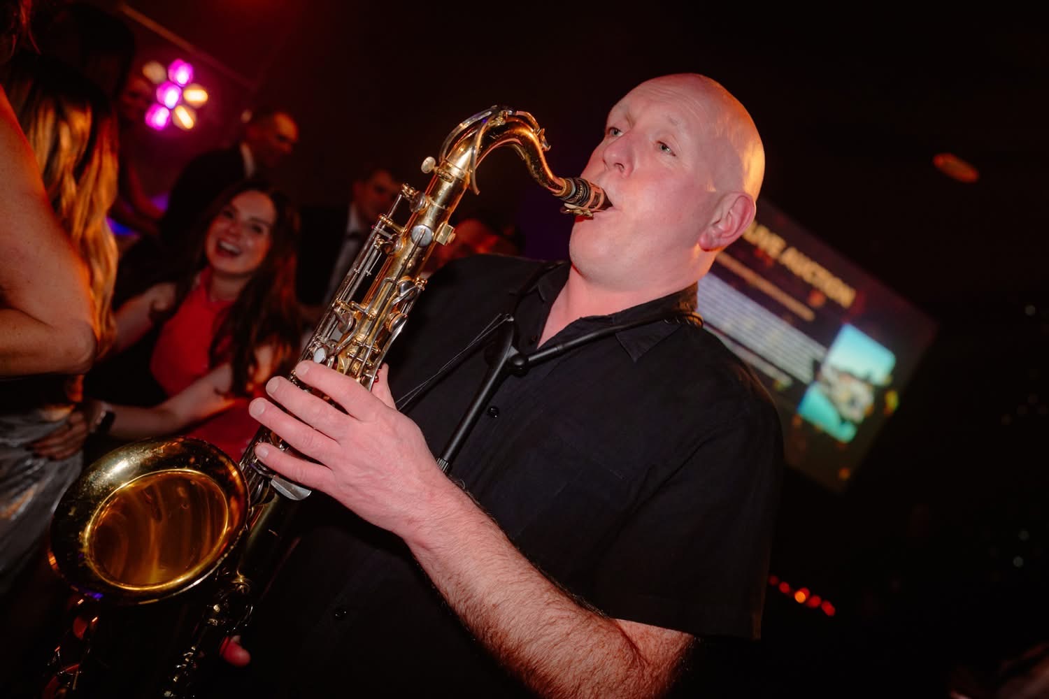 Bare Brass Band playing at Leeds Pride 2024.
